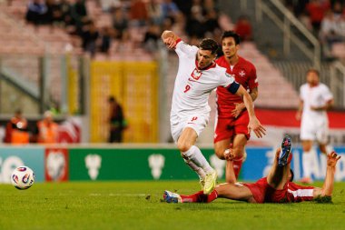 Robert Lewandowski ve Zach Muscat, 2026 Dünya Kupası eleme maçında Malta ve Polonya milli takımları arasında görüldü (Maciej Rogowski / Ball Raw Images)