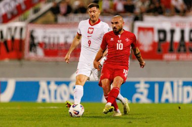 Robert Lewandowski ve Teddy Teuma, 2026 Dünya Kupası eleme maçında Malta ve Polonya milli takımları arasında görüldü (Maciej Rogowski / Ball Raw Images)