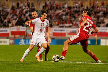 Jakub Kaminski ve Alexander Satariano, 2026 Dünya Kupası eleme maçında Malta ve Polonya milli takımları arasında görüldü (Maciej Rogowski / Ball Raw Images)