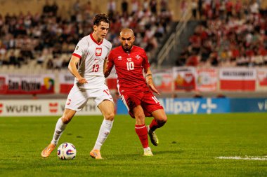 Jakub Kaminski ve Teddy Teuma, 2026 Dünya Kupası eleme maçında Malta ve Polonya milli takımları arasında görüldü (Maciej Rogowski / Ball Raw Images)