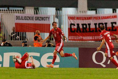 Irvin Cardona, 2026 Dünya Kupası eleme maçında Malta ve Polonya milli takımları arasında gol attıktan sonra kutlama yaparken görüldü (Maciej Rogowski / Ball Raw Images)