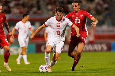 Jakub Kaminski ve Alexander Satariano, 2026 Dünya Kupası eleme maçında Malta ve Polonya milli takımları arasında görüldü (Maciej Rogowski / Ball Raw Images)