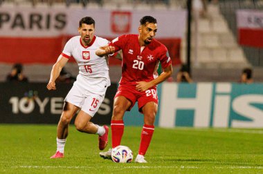 Pawel Wszolek ve İlyas Chouaref, 2026 Dünya Kupası eleme maçında Malta ve Polonya milli takımları arasında görüldü (Maciej Rogowski / Ball Raw Images)