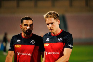 Zach Muscat ve Gabriel Mentz, 2026 Dünya Kupası eleme maçında Malta ve Polonya milli takımları arasında görüldü (Maciej Rogowski / Ball Raw Images)