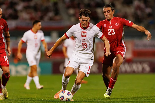 Jakub Kaminski ve Alexander Satariano, 2026 Dünya Kupası eleme maçında Malta ve Polonya milli takımları arasında görüldü (Maciej Rogowski / Ball Raw Images)