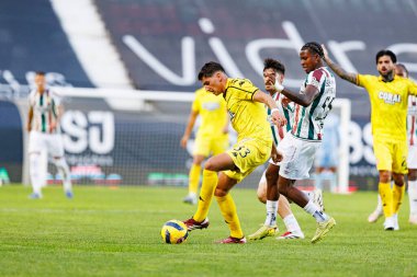 Francisco Goncalves ve Sidny Lopes Cabral Liga Portekiz maçı sırasında CF Estrela Amadora ve CD Nacional (Maciej Rogowski / Ball Raw Images)