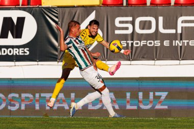 Luan Patrick ve Jose Gomes Liga Portekiz maçı sırasında CF Estrela Amadora ve CD Nacional (Maciej Rogowski / Ball Raw Images)