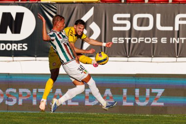 Luan Patrick ve Jose Gomes Liga Portekiz maçı sırasında CF Estrela Amadora ve CD Nacional (Maciej Rogowski / Ball Raw Images)