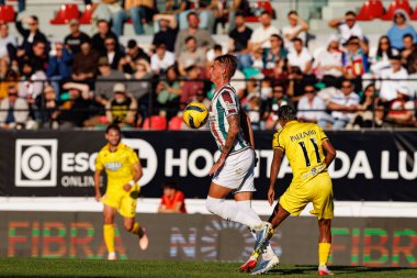 Luean Patrick ve Paulinho Boia, Liga Portekiz maçı sırasında CF Estrela Amadora ve CD Nacional (Maciej Rogowski / Ball Raw Images) takımları arasında görüldü.)
