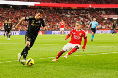 Andre Geraldes ve Gianluca Prestianni, Liga Portekiz maçı sırasında SL Benfica ve Casa Pia AC (Maciej Rogowski / Ball Raw Images)