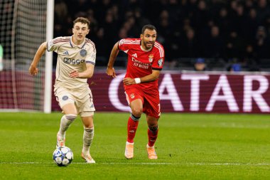 Youri Baas ve Vangelis Pavlidis, AFC Ajax ve SL Benfica (Maciej Rogowski / Ball Raw Images) arasındaki Şampiyonlar Ligi faz oyununda görüldü)