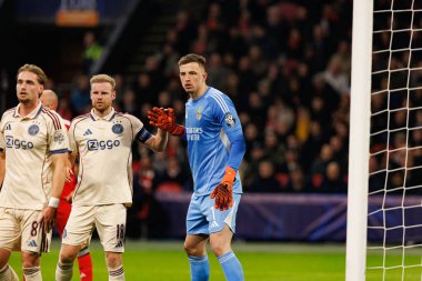 Davy Klaassen ve Anatoliy Trubin, AFC Ajax ve SL Benfica (Maciej Rogowski / Ball Raw Images) arasındaki Şampiyonlar Ligi faz maçında görüldü)