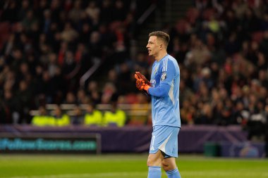 Anatoliy Trubin, AFC Ajax ve SL Benfica (Maciej Rogowski / Ball Raw Images) arasında Şampiyonlar Ligi faz oyunu sırasında görüldü)