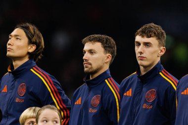 AFC Ajax ve SL Benfica (Maciej Rogowski / Ball Raw Images) arasındaki Şampiyonlar Ligi faz maçında Ko Itakura, Youri Regeer ve Youri Baas görüldü.)