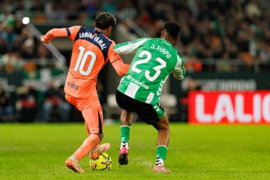 Lamine Yamal ve Junior Firpo, Real Betis Balompie ve FC Barcelona (Maciej Rogowski / Ball Raw Images) takımları arasında LaLiga EA Sports maçında görüldü.)
