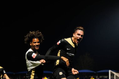 Steven Baseya ve Marko Milovanoviç Marezi, FC Alverca ve CD Nacional (Maciej Rogowski / Ball Raw Images) takımları arasındaki Liga Portekiz maçında gol attıktan sonra kutlama yaparken görüldü.)