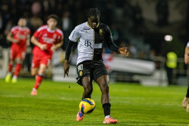 Assane Ndiaye Dione, SC Farense ve SL Benfica takımları arasında Estadio Sao Luis (Maciej Rogowski / Ball Raw Images) maçında görüldü.)