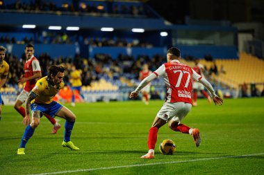 Ricard Sanchez ve Gabriel Martinez Liga Portekiz maçı sırasında Estoril Praia ve SC Braga takımları arasında Estadio Antonio Coimbra da Mota (Maciej Rogowski / Ball Raw Images)
