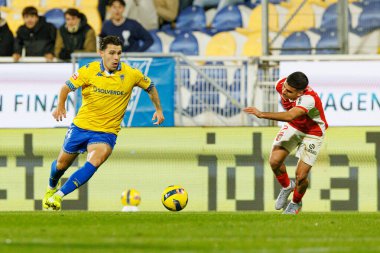 Pedro Amaral ve Victor Gomez, Liga Portekiz maçı sırasında Estoril Praia ve SC Braga takımları arasında Estadio Antonio Coimbra da Mota (Maciej Rogowski / Ball Raw Images)