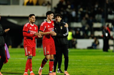Franjo İvanoviç, Manu Silva ve Rafael Obrador, SC Farense ve SL Benfica takımları arasında oynanan maçta Estadio Sao Luis 'de (Maciej Rogowski / Ball Raw Images) görüldü.)