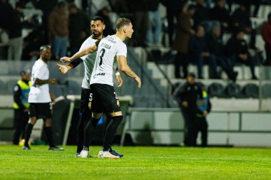 Franco Romero ve Lucas DAgrella, SC Farense ve SL Benfica takımları arasında Estadio Sao Luis (Maciej Rogowski / Ball Raw Images) maçında görüldü.)