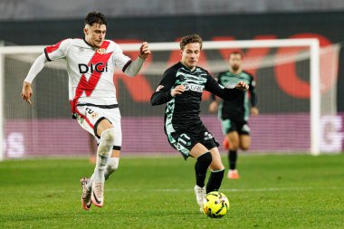 Andrei Ratiu ve Rodrigo Riquelme, LaLiga EA Spor Maçı sırasında Rayo Vallecano ve Real Betis Balompie (Maciej Rogowski / Ball Raw Images) takımları arasında görüldü.)