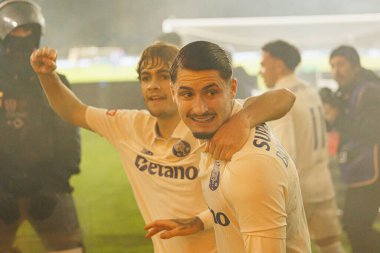 Porto oyuncuları, FC Alverca ve FC Porto (Maciej Rogowski / Ball Raw Images) takımları arasında Liga Portekiz maçında Borja Sainz 'den gol üstüne gol atarken görüldü.)