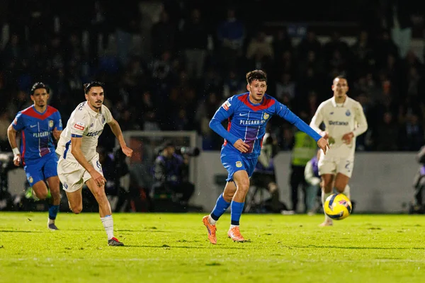 Stephen Eustaquio ve Cedric Nuozzi, Liga Portekiz maçında FC Alverca ve FC Porto (Maciej Rogowski / Ball Raw Images) takımları arasında görüldü.)