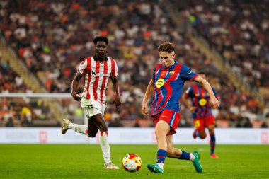 Adama Boiro ve Fermin Lopez İspanya Süper Kupası yarı final maçında FC Barcelona ve Athletic Club (Maciej Rogowski / Ball Raw Images) arasında görüldüler.)