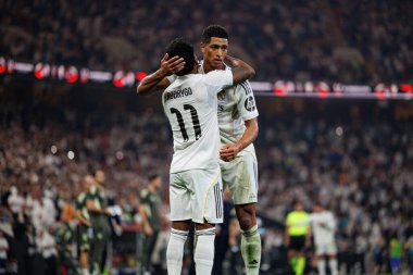 Rodrygo Goes ve Jude Bellingham, Atletico de Madrid ve Real Madrid (Maciej Rogowski / Ball Raw Images) arasında oynanan İspanya Süper Kupası yarı final maçında gol attıktan sonra kutlama yaparken görüldü.)