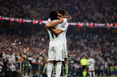 Rodrygo Goes ve Jude Bellingham, Atletico de Madrid ve Real Madrid (Maciej Rogowski / Ball Raw Images) arasında oynanan İspanya Süper Kupası yarı final maçında gol attıktan sonra kutlama yaparken görüldü.)