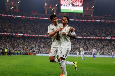 Gonzalo Garcia ve Rodrygo, Atletico de Madrid ve Real Madrid (Maciej Rogowski / Ball Raw Images) arasında oynanan İspanya Süper Kupası yarı final maçında gol attıktan sonra kutlama yaparken görüldü.)