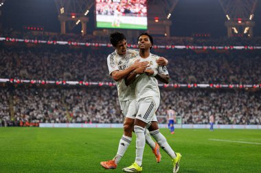 Gonzalo Garcia ve Rodrygo, Atletico de Madrid ve Real Madrid (Maciej Rogowski / Ball Raw Images) arasında oynanan İspanya Süper Kupası yarı final maçında gol attıktan sonra kutlama yaparken görüldü.)