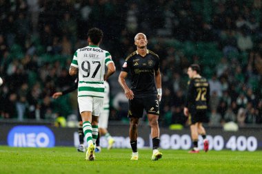 Luis Suarez ve Domingo Jose Gabriel Bandeira Kaly, Liga Portekiz maçı sırasında Estadio Jose Alvalade 'deki Casa Pia AC (Maciej Rogowski / Ball Raw Images) takımları arasında görüldü.)