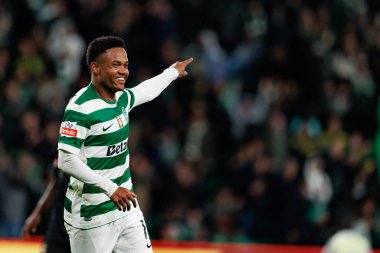 Cin Catamo, Liga Portekiz maçında attığı gol sonrasında Estadio Jose Alvalade 'deki Casa Pia AC (Maciej Rogowski / Ball Raw Images) takımları arasında kutlama yaparken görüldü.)