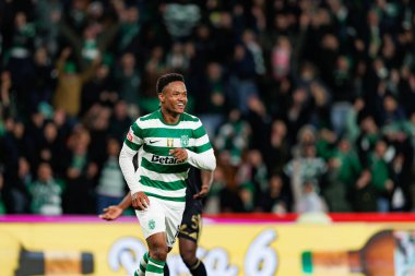 Cin Catamo, Liga Portekiz maçında attığı gol sonrasında Estadio Jose Alvalade 'deki Casa Pia AC (Maciej Rogowski / Ball Raw Images) takımları arasında kutlama yaparken görüldü.)