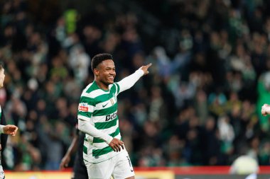 Cin Catamo, Liga Portekiz maçında attığı gol sonrasında Estadio Jose Alvalade 'deki Casa Pia AC (Maciej Rogowski / Ball Raw Images) takımları arasında kutlama yaparken görüldü.)