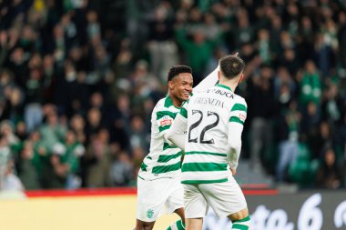 Cin Catamo, Liga Portekiz maçında attığı gol sonrasında Estadio Jose Alvalade 'deki Casa Pia AC (Maciej Rogowski / Ball Raw Images) takımları arasında kutlama yaparken görüldü.)