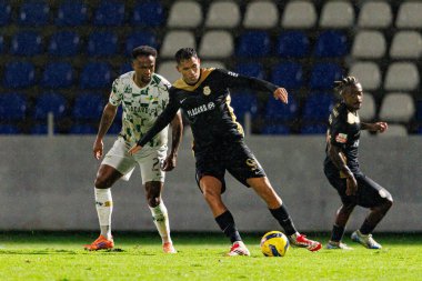 Jobson de Brito Gonzaga Maracas ve Sandro Lima, Liga Portekiz maçı sırasında FC Alverca ve Moreirense FC (Maciej Rogowski / Ball Raw Images) takımları arasında görüldü.)