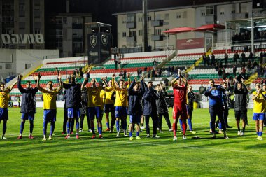 Estoril 'in oyuncuları Liga Portekiz maçı sırasında Estrela Amadora ve GD Estoril praia takımları arasında Estadio Jose Gomes (Maciej Rogowski / Ball Raw Images)