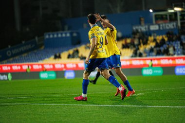 Alejandro Marques, Liga Portekiz maçında GD Estoril Praia ve Vitoria SC takımları arasında Estadio Antonio Coimbra da Mota (Maciej Rogowski / Ball Raw Images) maçında gol attıktan sonra kutlama yaparken görüldü.)