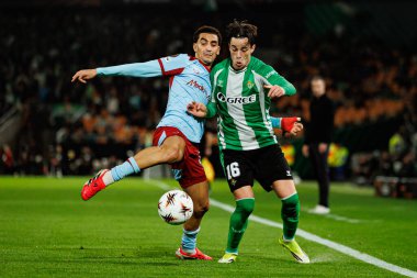 UEFA Avrupa Ligi maçında Real Betis Balompie ve Feyenoord Rotterdam (Maciej Rogowski / Ball Raw Images) takımları arasında Usame Targhalline ve Valentin Gomez görüldü.)