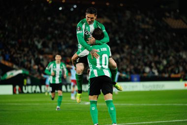 Chimy Avila and Ez Abde seen celebrating after goal during UEFA Europa League game between teams of Real Betis Balompie and Feyenoord Rotterdam  (Maciej Rogowski/Ball Raw Images)