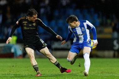 Gaizka Larrazabal ve Oskar Pietuszewski, Liga Portekiz maçında Casa Pia AC ile FC Porto (Maciej Rogowski / Ball Raw Images) arasında görüldü.)