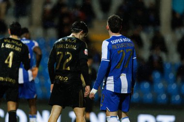 Gaizka Larrazabal ve Oskar Pietuszewski, Liga Portekiz maçında Casa Pia AC ile FC Porto (Maciej Rogowski / Ball Raw Images) arasında görüldü.)
