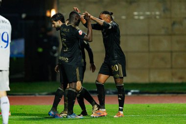 Casa Pia oyuncuları Liga Portekiz maçında Casa Pia AC ve FC Porto (Maciej Rogowski / Ball Raw Images) arasında gol üstüne gol atarken görüldü.)