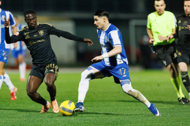 Lawrence Ofori ve Borja Sainz, Liga Portekiz maçında Casa Pia AC ile FC Porto (Maciej Rogowski / Ball Raw Images) arasında görüldü.)