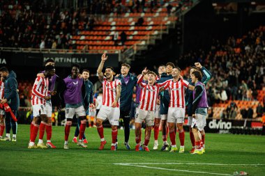 Copa Del Rey çeyrek final maçında Valencia CF ve Athletic Club (Maciej Rogowski / Ball Raw Images) takımları arasında kutlanan Athletic oyuncuları görülüyor.)