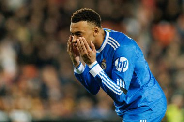 Kylian Mbappe, Valencia CF ve Real Madrid CF (Maciej Rogowski / Ball Raw Images) takımları arasındaki LaLiga EA Sports maçında gol attıktan sonra kutlama yaparken görülüyor.)