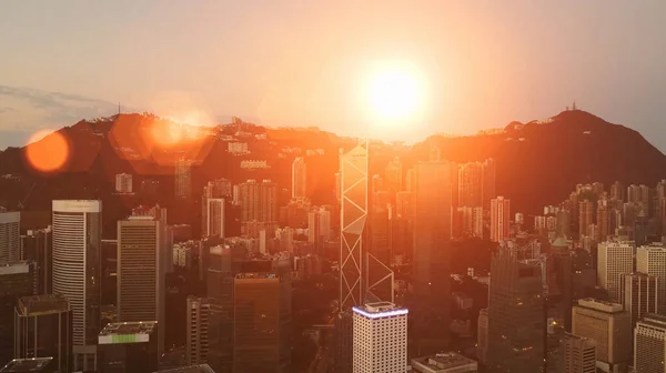 Epic sunset in financial center of Hong Kong. AERIAL view. — Stock Photo, Image